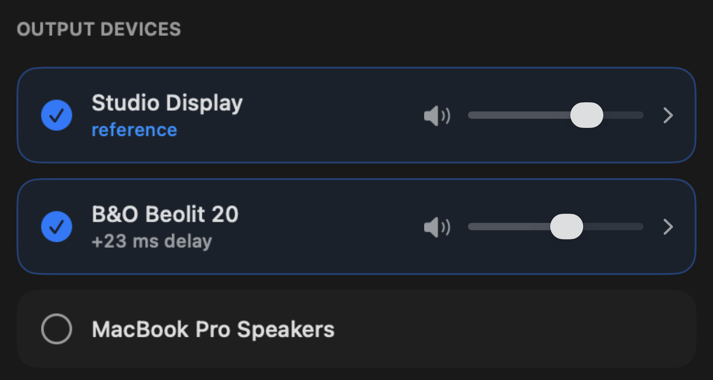 Output device list with a Studio Display as reference and a B&O speaker playing the lows